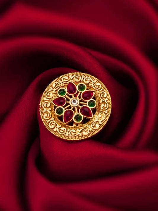 Antique-style ring featuring a lotus medallion design with intricate detailing.