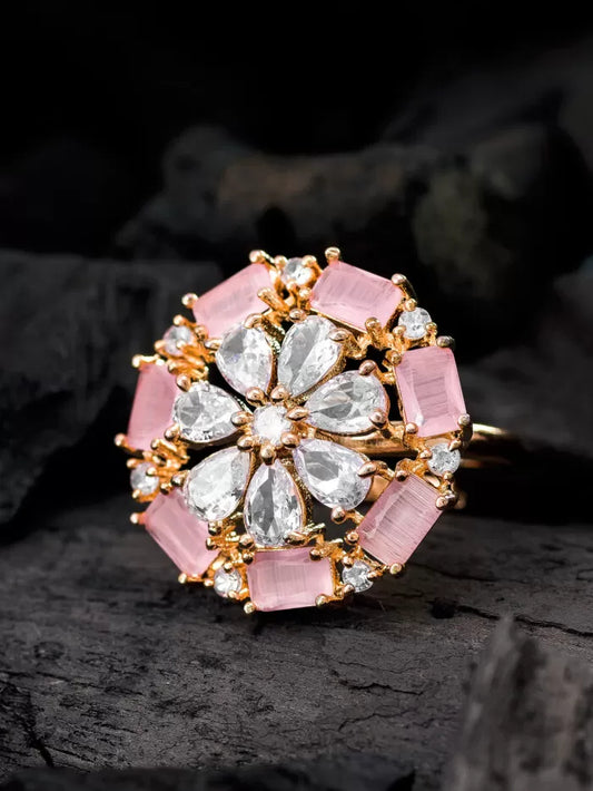 Delicate ring with a soft blush color and a blooming floral design featuring crystals.