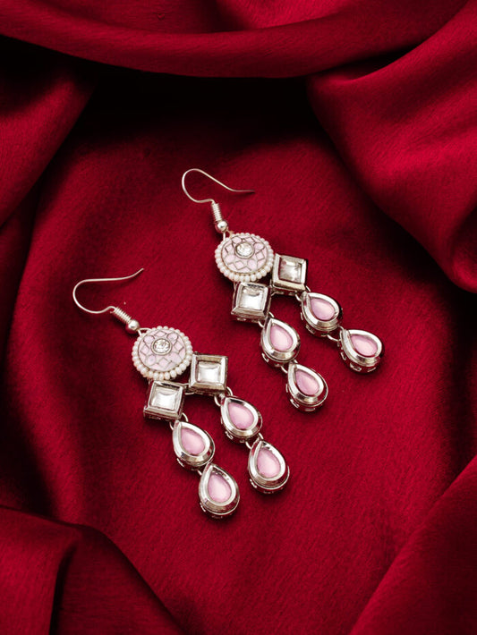 Beautiful kundan earrings with a flowing 'cascade' design in a soft blush color.