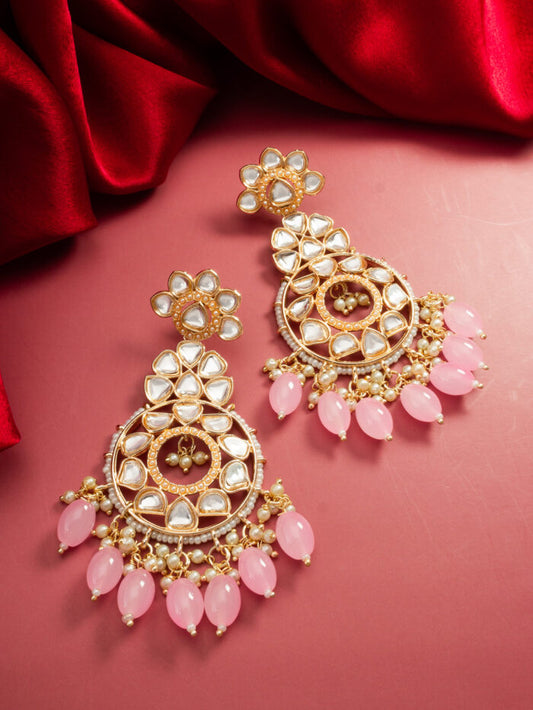 Statement chandelier earrings with soft blush pink kundan work.