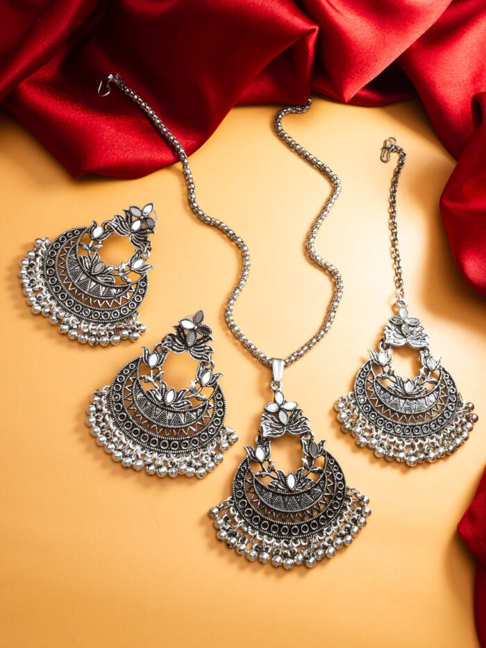 Regal bohemian-style choker necklace set in oxidized silver.