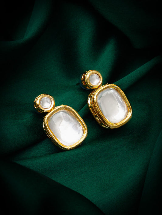 Elegant gold-plated chandelier earrings featuring classic white kundan work.