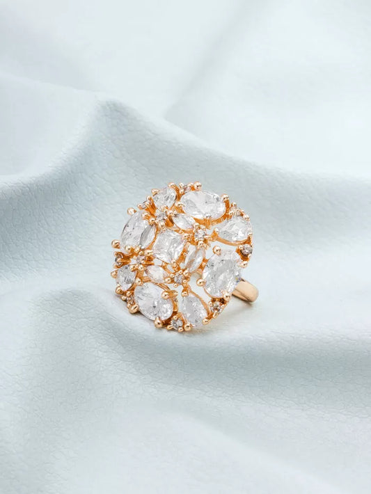 Elegant rose gold ring with a blooming floral design accented with crystals.