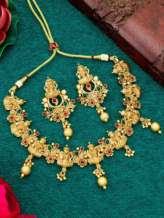 Sacred necklace set in antique gold featuring the goddess Lakshmi.