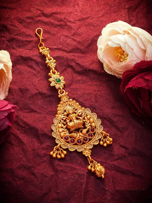 Sacred mang tikka inspired by a 'Devi' (goddess) design with a divine radiance.