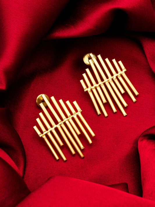 Luxurious statement earrings with a linear 'cascade' of gold elements.