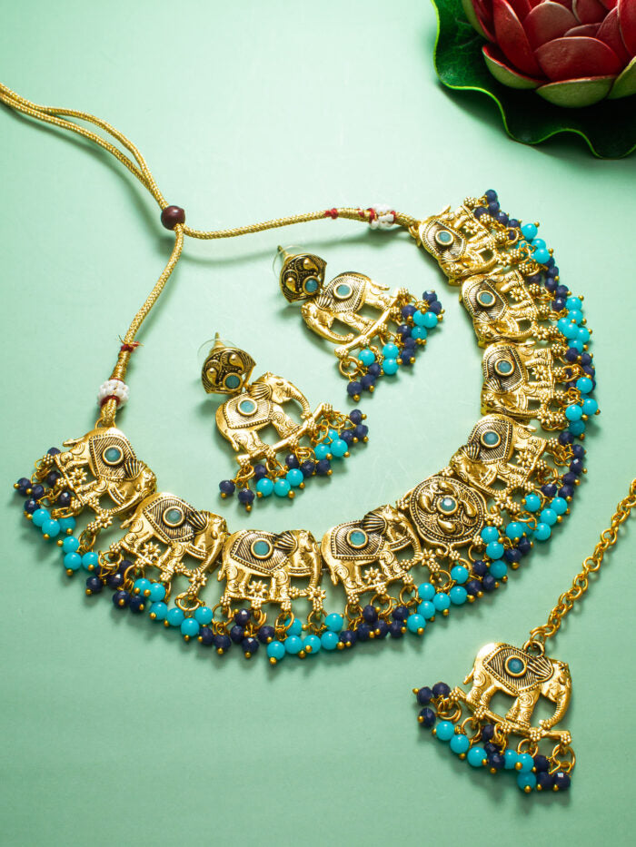 Stunning multicolor necklace set featuring elephant motifs, complete with a maang tikka.