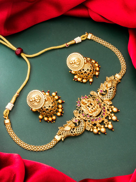 Regal temple-style necklace set featuring the goddess Lakshmi and peacock motifs.