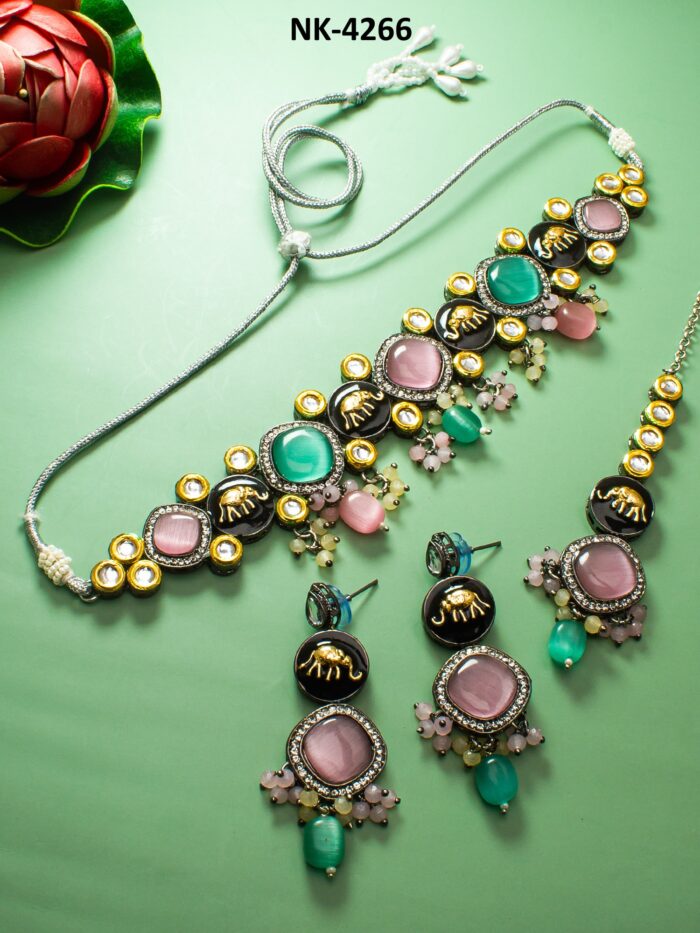 Regal jewelry set with multicolor kundan work and royal elephant motifs.