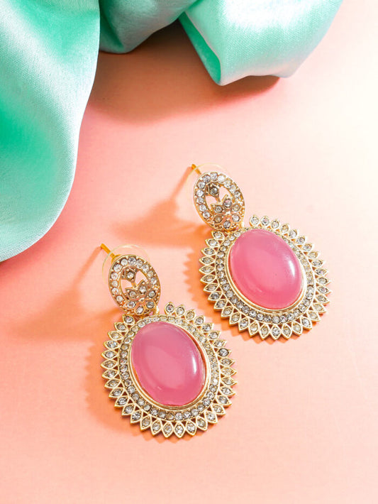Elegant royal-style drop earrings with a soft peach color and a radiant shine.