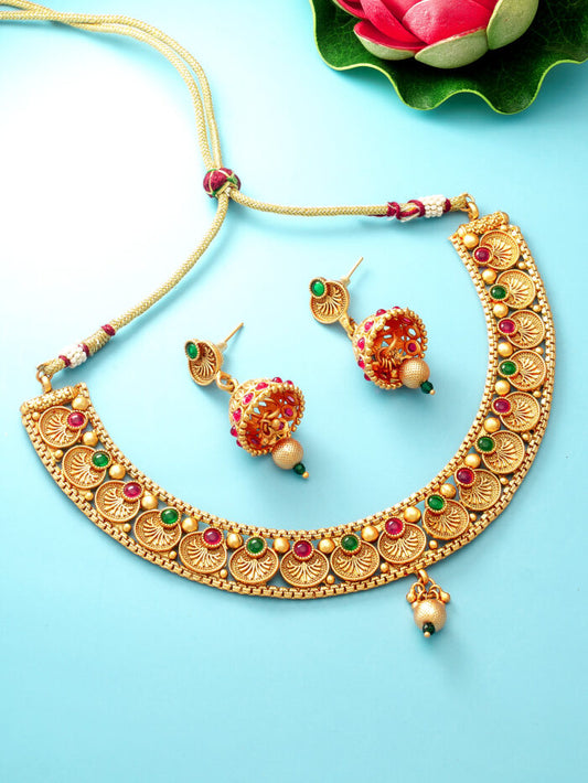Ornate gold necklace set featuring traditional coin motifs.