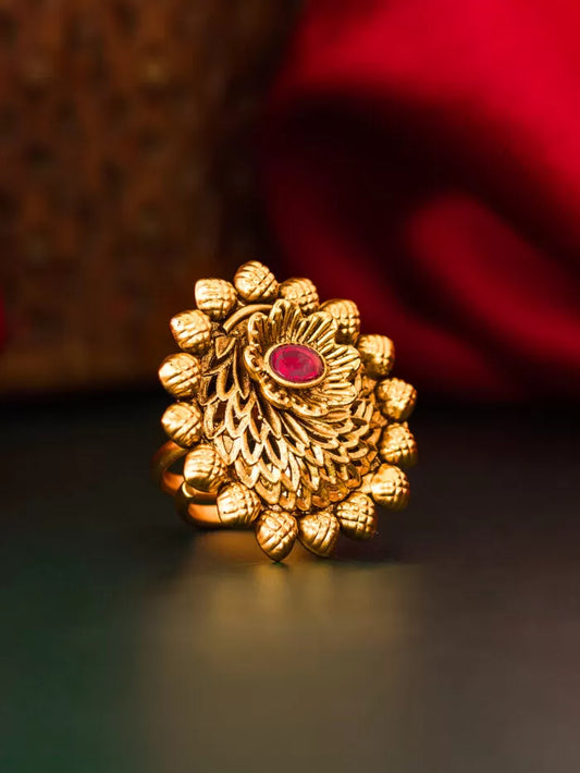 Ornate ring with a regal design featuring a blooming lotus motif.