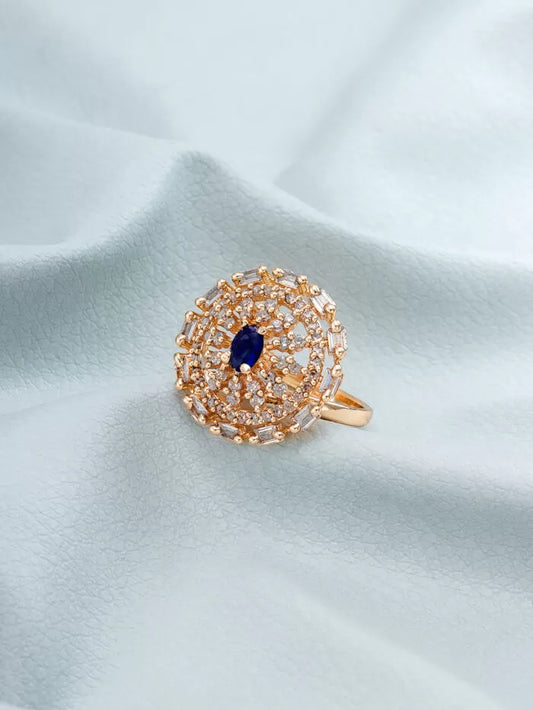 Luxurious gold ring featuring a prominent blooming floral design set with diamonds.