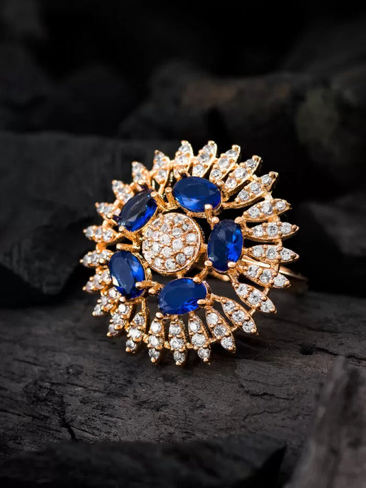 Regal statement ring in a striking blue color with a radiant shine.