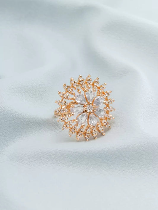 Statement ring with a sparkling white floral design set with 'AD' (American Diamonds).